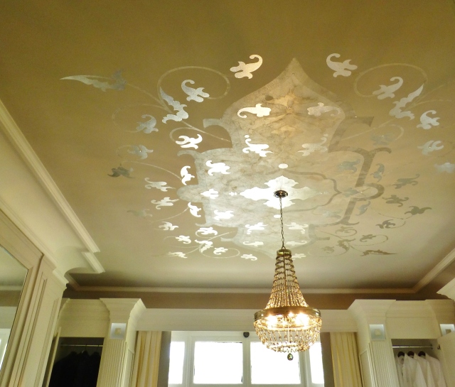 The amazing painted ceiling in the formal dressing lounge, features metallic and pearl finishes.  It even has sequin embellishments!  What a great feature to add interest to the white cabinetry throughout.